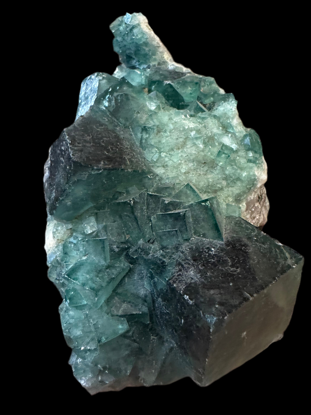 Fluorite crystal Madagascar fluorescent 380 gr; 10 by 7.5 by 5 cm
