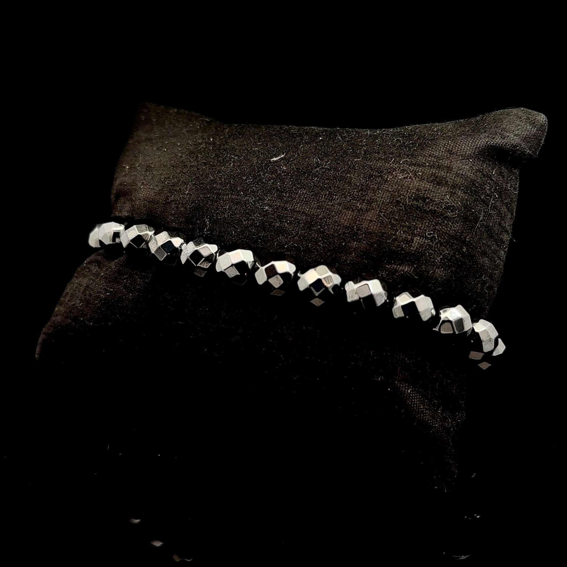 Hematite bracelet, 26 faceted beads, 8 mm