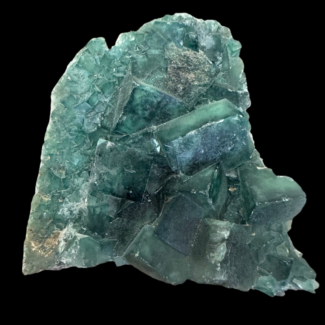 Fluorite crystal Madagascar fluorescent 760 gr; 10.5 by 12 by 4 cm
