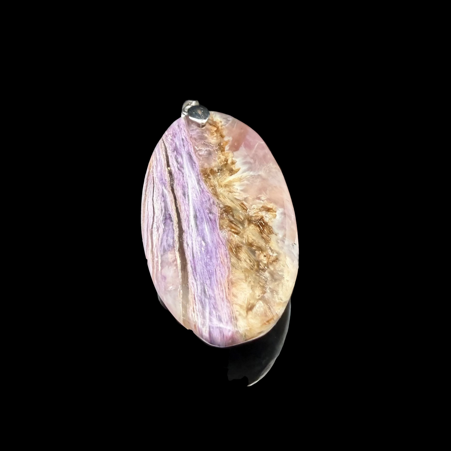 Charoite pendant 25 by 60 by 4 mm