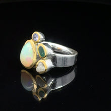 Загрузить изображение в средство просмотра галереи, Кольцо Опал благородный эфиопия, изумрад, алмаз, танзанит 18 размер; серебро 925
