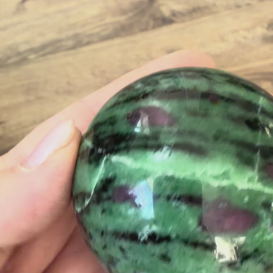 Zoisite with Ruby Sphere 360 g 60 mm