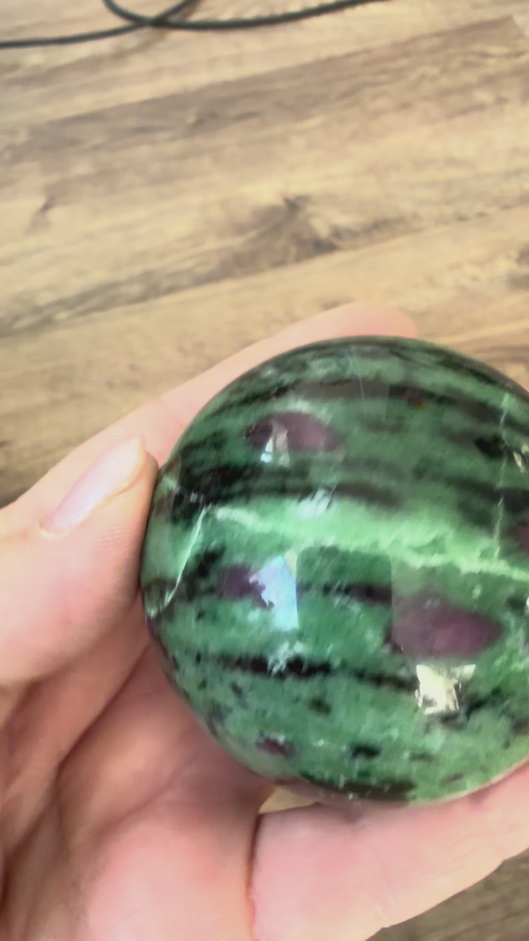 Zoisite with Ruby Sphere 360 g 60 mm